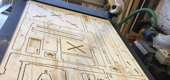 a sheet of wood with templates cut out